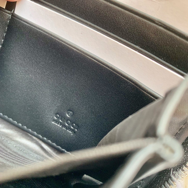 G*u*i leather zip around wallet
