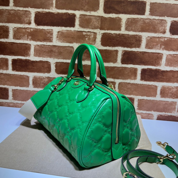 G*u*i gg matelassé leather top handle bag