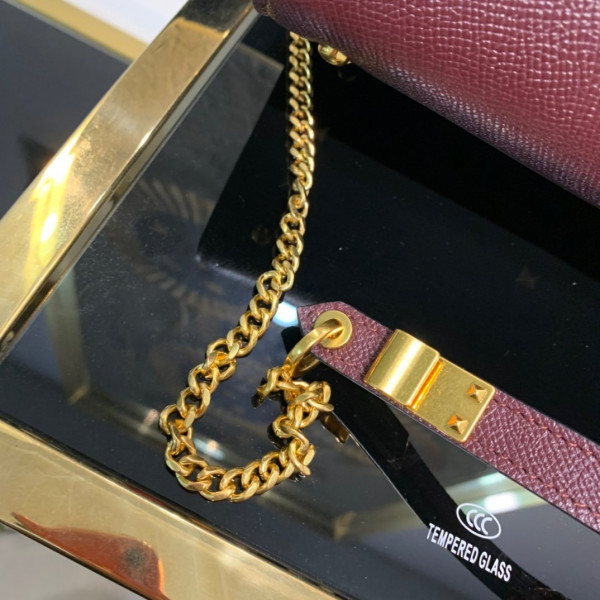 Va1e*ntin0 small vsling grainy calfskin handbag