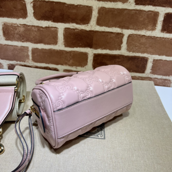 G*u*i gg matelassé leather top handle bag