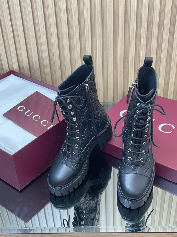 G*u*i boots