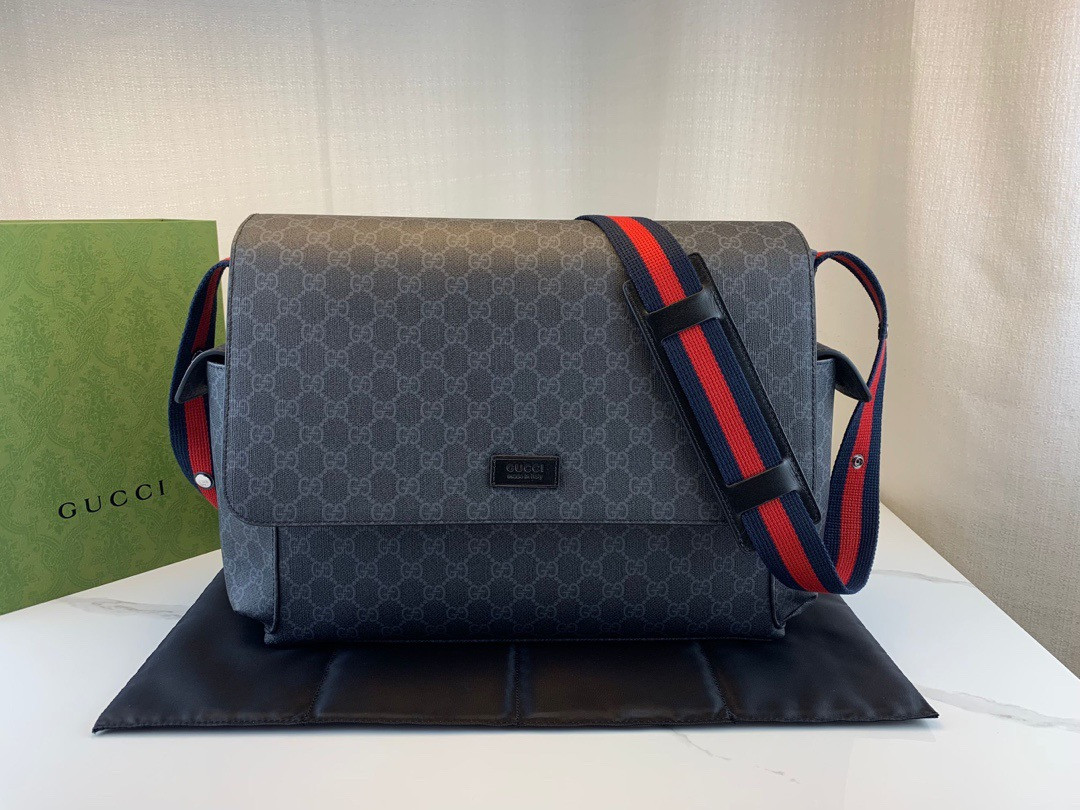 G*u*i gg plus diaper bag