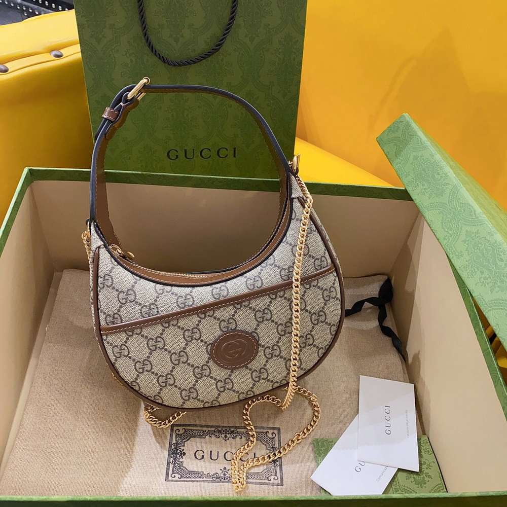 G*u*i half-moon-shaped mini bag with interlocking g