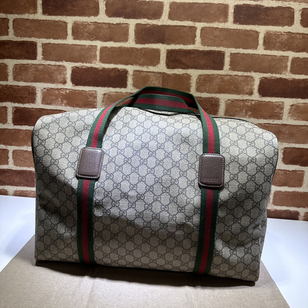 G*u*i medium duffle bag with web